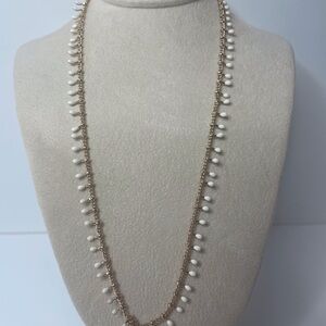 Elegant Gold and White Beaded Necklace